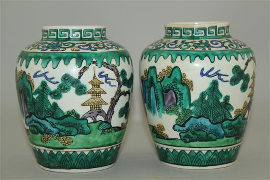 A pair of Japanese green Kutani ovoid jars, late 19th century, 13cm